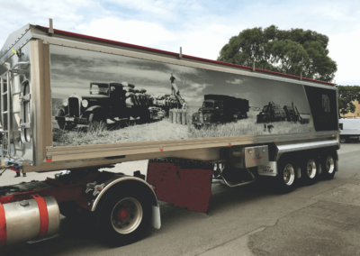 A semi’s trailer shows how effective a large format sign can be on the tippers trailer